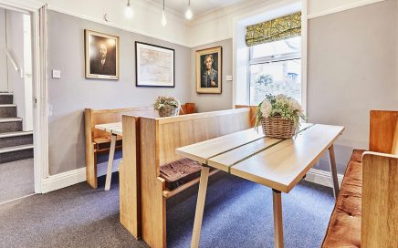 The dining room in Earby Hostel has big, wide benches which are perfect for large meals or playing board games.