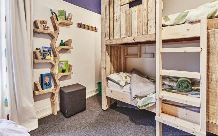 The tree house bedroom comes with books, toys, bedding and towels.
